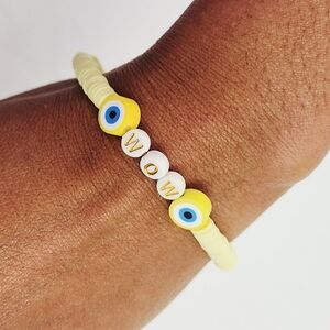 Handmade Clay Heart Bead Bracelet With The Word WOW